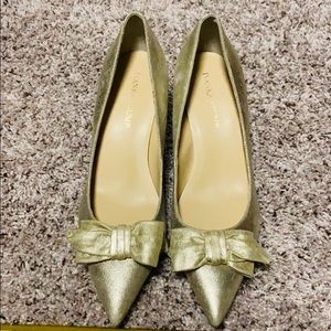 Ivanka Trump gold bow tie shoes
